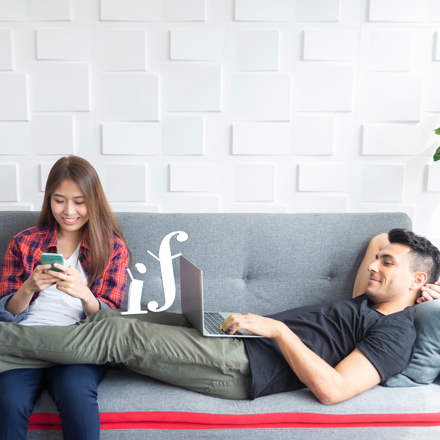 Couple Relaxing On Sofa At Home Using Mobile And Laptop To Play Work And Connect To Another People In T20 9L4xo6 Copy