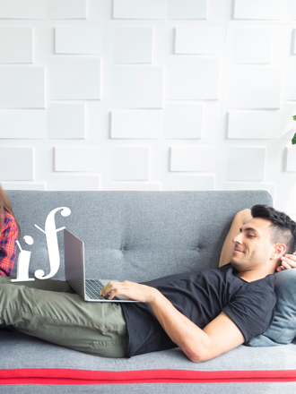 Couple Relaxing On Sofa At Home Using Mobile And Laptop To Play Work And Connect To Another People In T20 9L4xo6 Copy